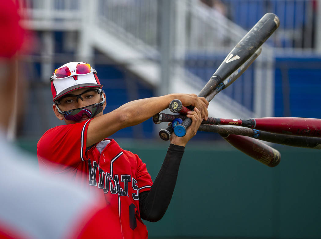 Las Vegas' Oliver Reyes (6) warms up to bat versus Reno during their state baseball tournament ...