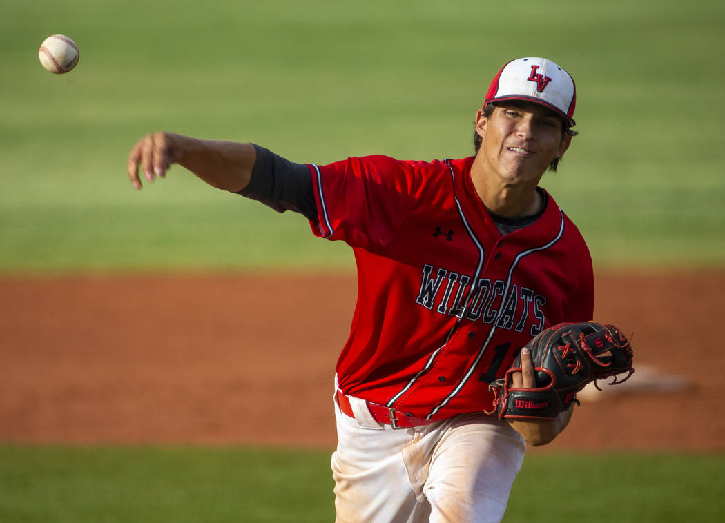 Las Vegas pitcher Nathan Freimuth (12) releases a throw versus Reno during their state baseball ...