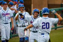 Reno players celebrate a score by teammate Coleman Schmidt (20) versus Las Vegas during their s ...