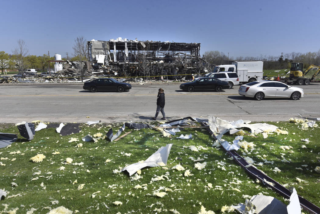 Debris is scattered across the street at the scene of an explosion at AB Specialty Silicones on ...