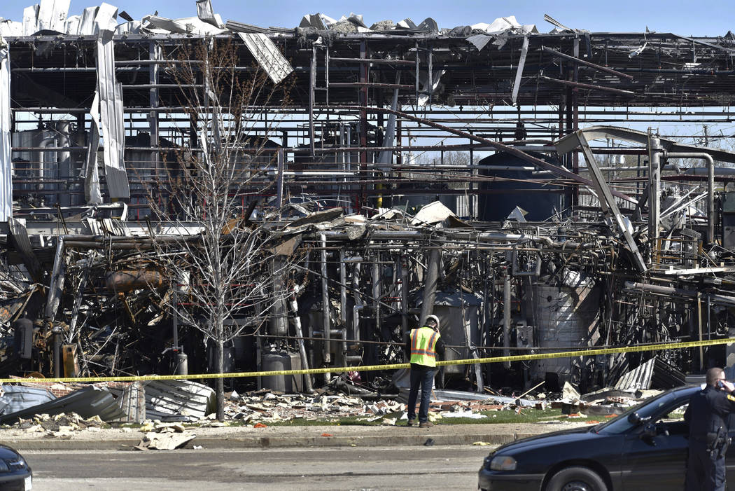 Emergency personnel work at the scene of an explosion at AB Specialty Silicones on Sunset Ave. ...