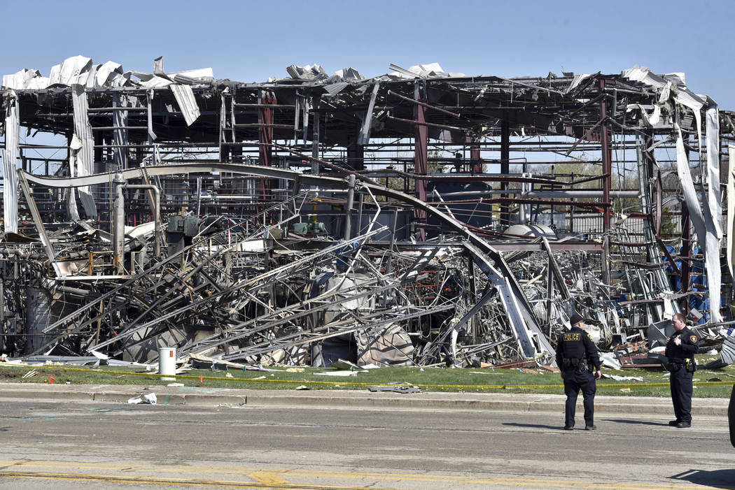 Emergency personnel work at the scene of an explosion at AB Specialty Silicones on Sunset Ave. ...