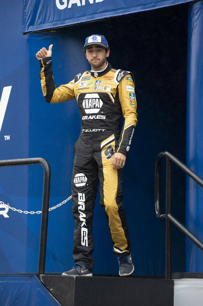 Chase Elliott gives a thumbs-up during driver introductions at a NASCAR Cup Series auto race Su ...