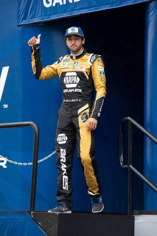 Chase Elliott gives a thumbs-up during driver introductions at a NASCAR Cup Series auto race Su ...