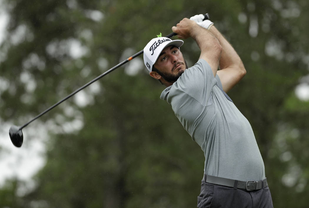 Max Homa watches his tee shot on the third hole during the final round of the Wells Fargo Champ ...