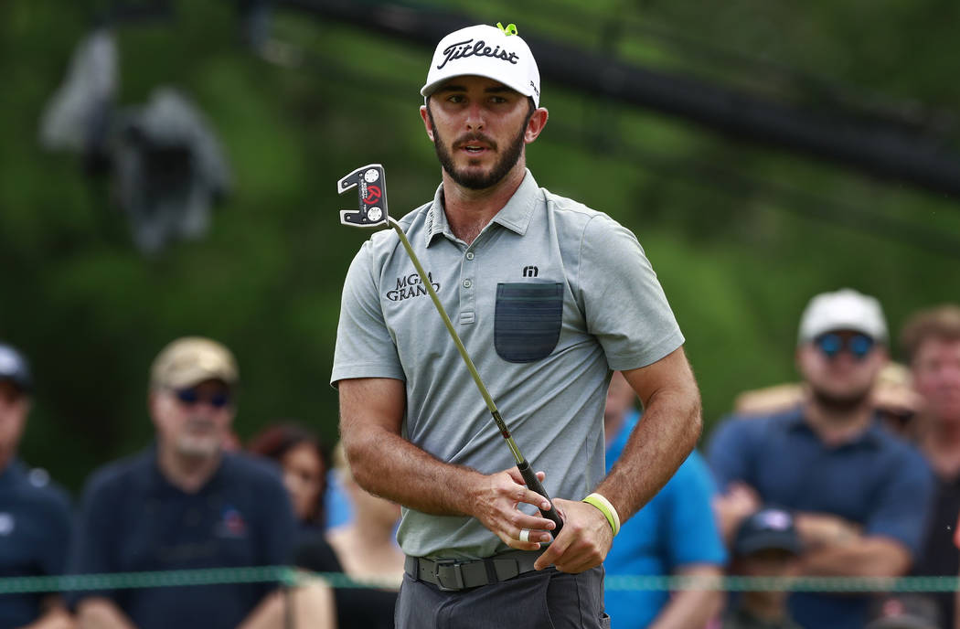 Max Homa watches his putt on the ninth hole during the final round of the Wells Fargo Champions ...