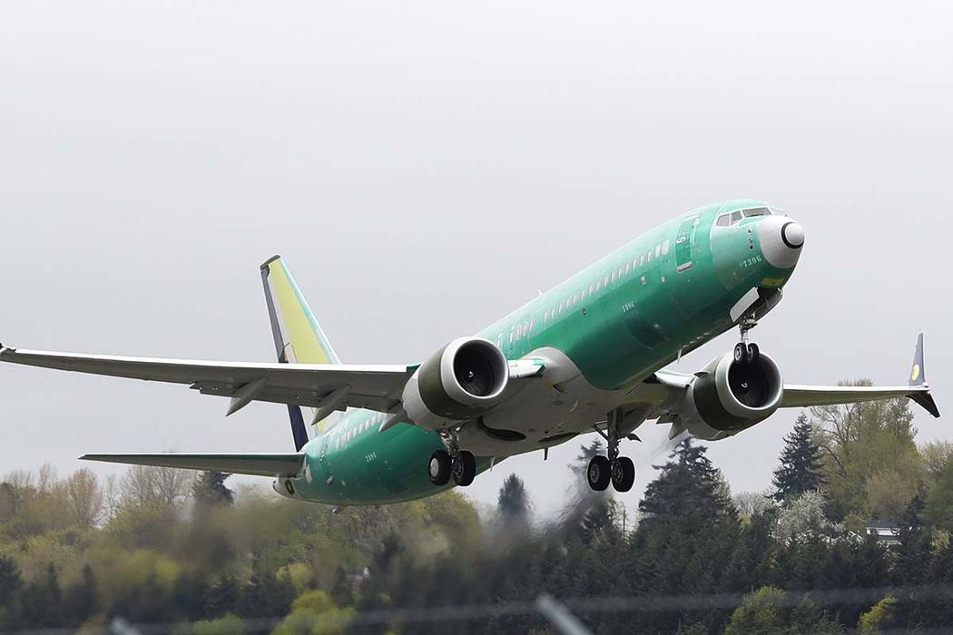 A Boeing 737 Max 8 airplane being built for India-based Jet Airways, takes off April 10, 2019, ...