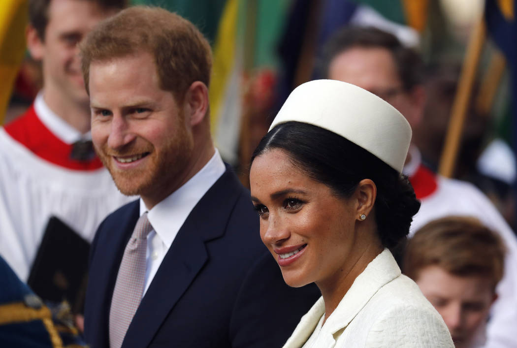 Britain's Prince Harry and Meghan, the Duchess of Sussex leave after the Commonwealth Service a ...