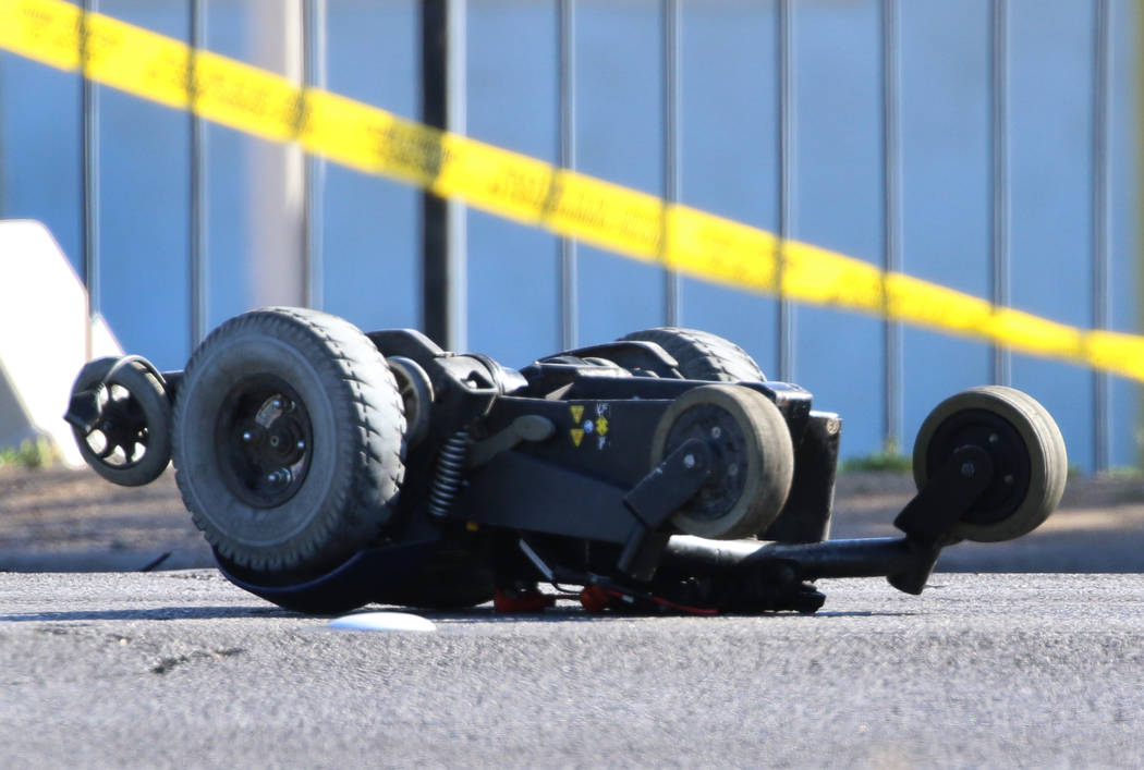 A motorized wheelchair is seen at the scene of a fatal crash at Boulder Highway and Sunset Road ...