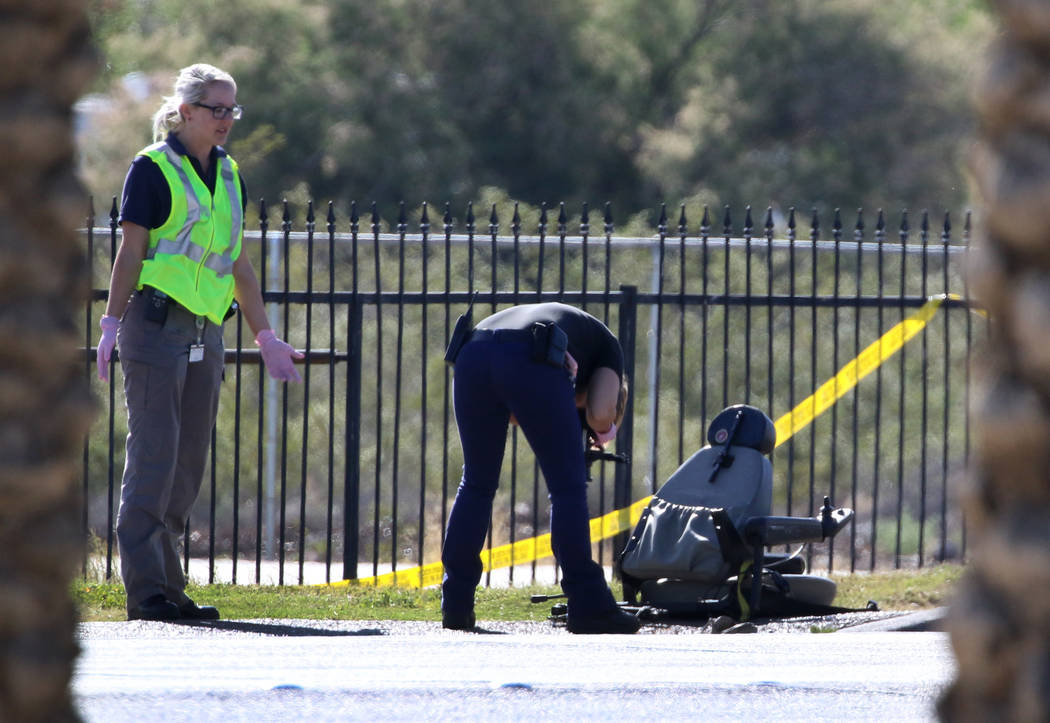 Henderson police investigate after a man in a motorized wheelchair was hit by a vehicle at Boul ...