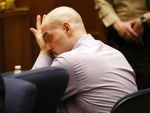 Michael Gargiulo, listens to his defense attorney Daniel Nardoni's opening statement in Los Ang ...