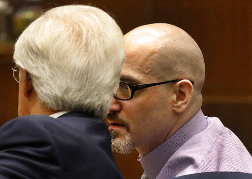 Michael Gargiulo, right, talks to his defense attorney Daniel Nardoni in Los Angeles Superior C ...