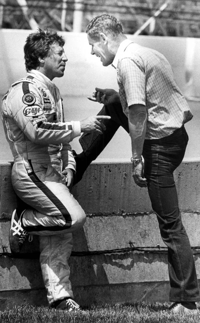 FILE - In this May 11, 1982, file photo, 1981 Indy 500 winner Bobby Unser, right, talks with 19 ...
