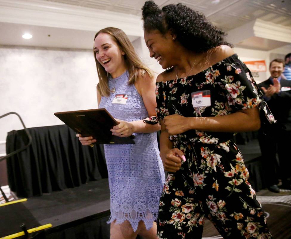 Erinn Veach, left and Kaeli Britt, editors of the Green Valley High School newspaper, The Inves ...