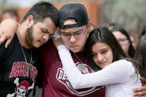 From left to right, Marcell Ibarra, 18, Daffne Anselmo, 16, and Jamilet Fragoso, 16, comfort ea ...