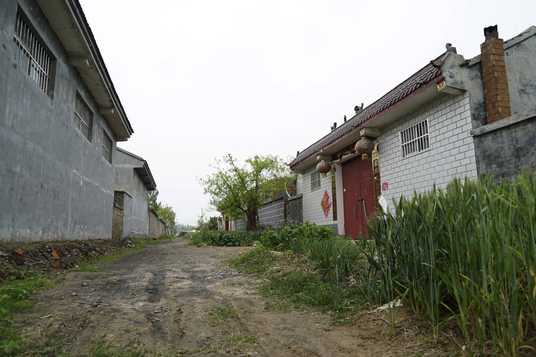 In this April 29, 2019 photo, lanterns hang over the front door of the former home of Li Tao an ...