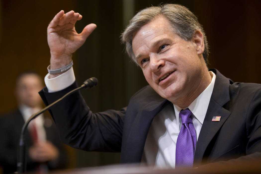 FBI Director Christopher Wray testifies during a hearing of the Appropriations Subcommittee for ...