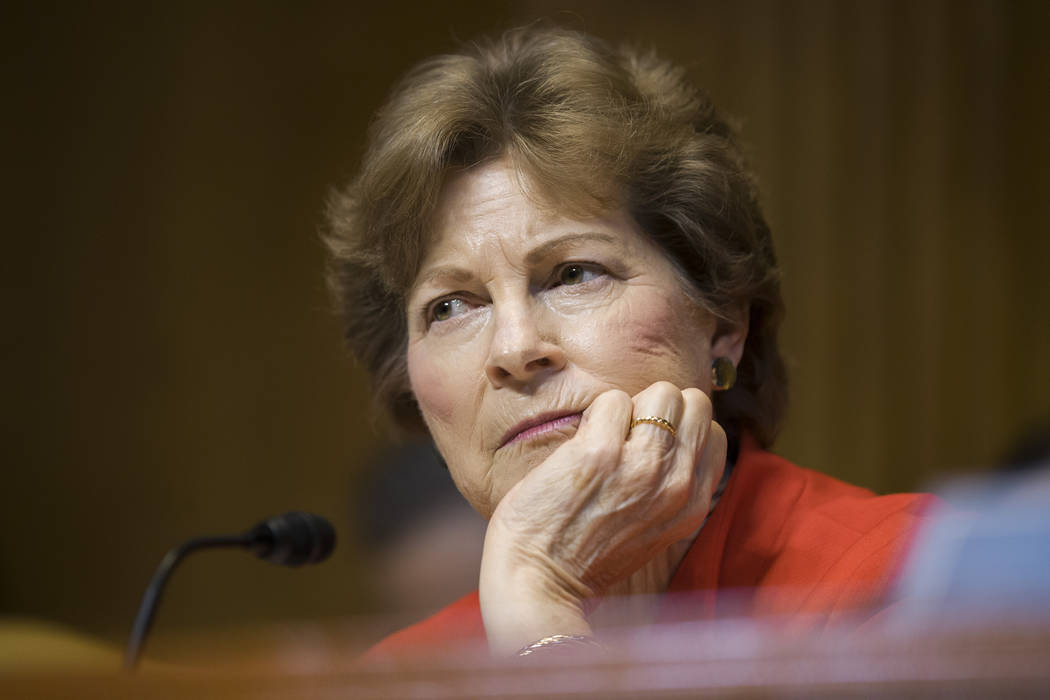 Subcommittee ranking member Jeanne Shaheen, D-N.H., listens to FBI Director Christopher Wray as ...