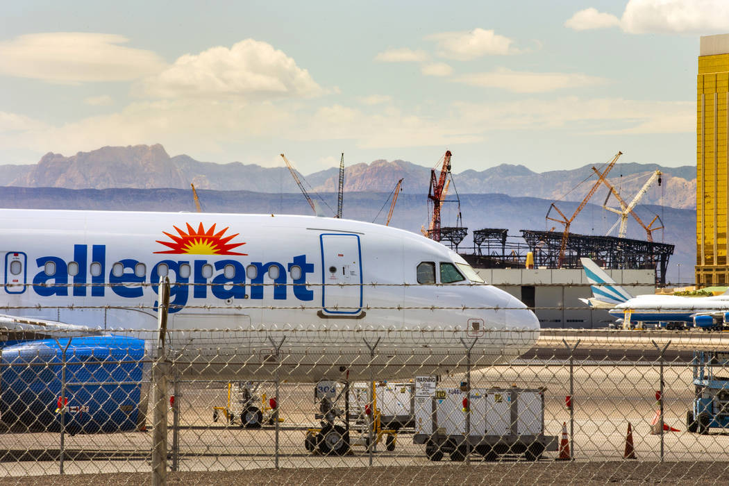 A Las Vegas-based Allegiant Air plane sitting on the tarmac at McCarran International Airport w ...