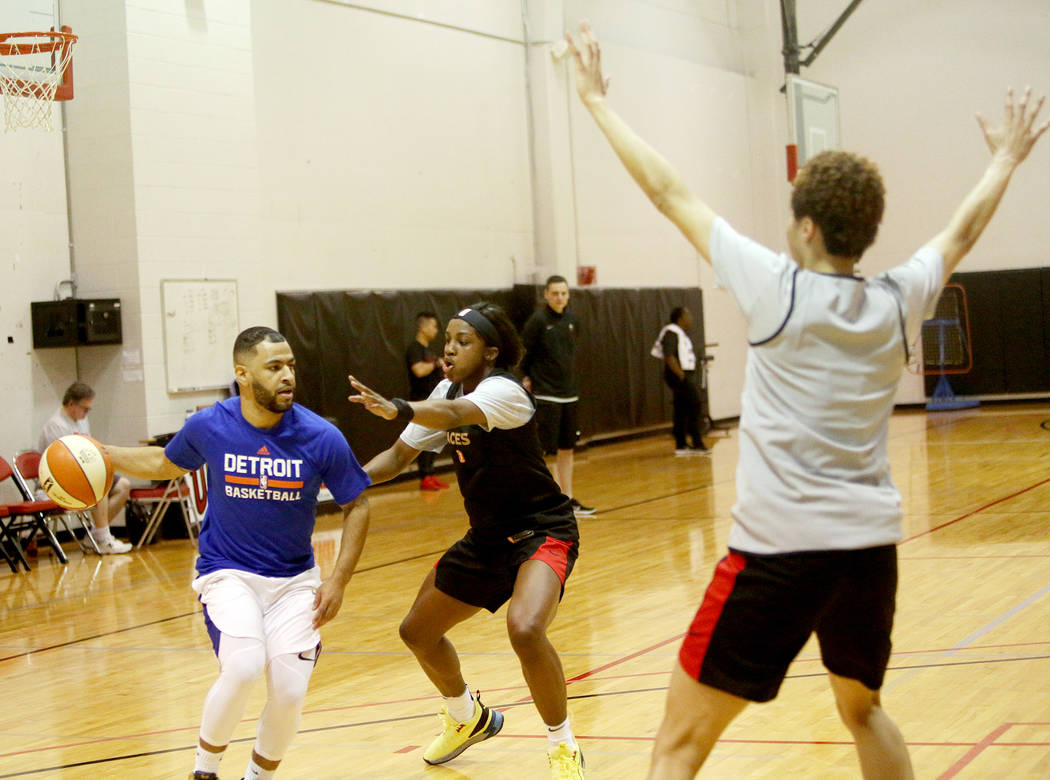 Jackie Young, center, during the first training camp of the season at Cox Pavilion in Las Vegas ...