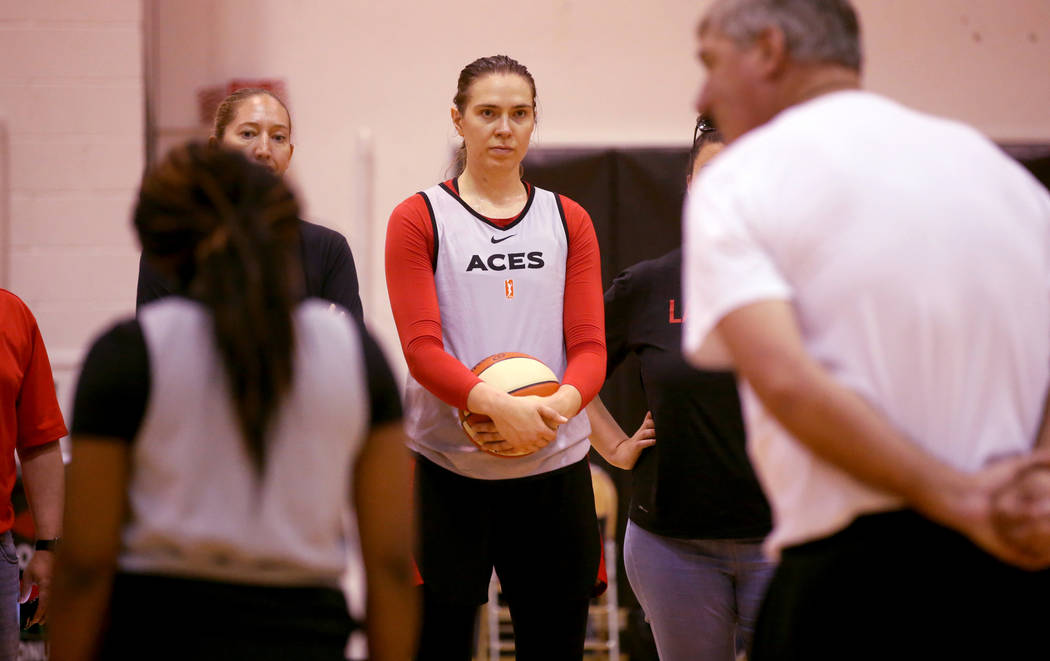 Aces center Ruth Hamblin gets instruction from coach Bill Laimbeer during practice at Cox Pavil ...