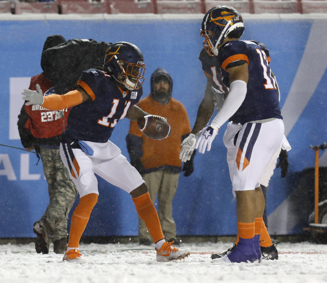 Orlando Apollos wide receiver Donteea Dye Jr. (11) celebrates scoring a touchdown with Orlando ...