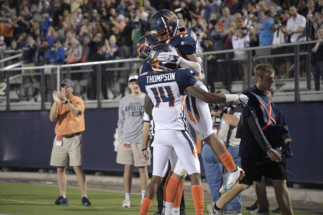 Orlando Apollos receiver Jalin Marshall (17) is congratulated by teammates after scoring a touc ...