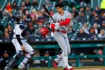 Los Angeles Angels Shohei Ohtani loses his helmet at bat against the Detroit Tigers in the firs ...