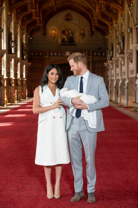 Britain's Prince Harry and Meghan, Duchess of Sussex, during a photocall with their newborn son ...