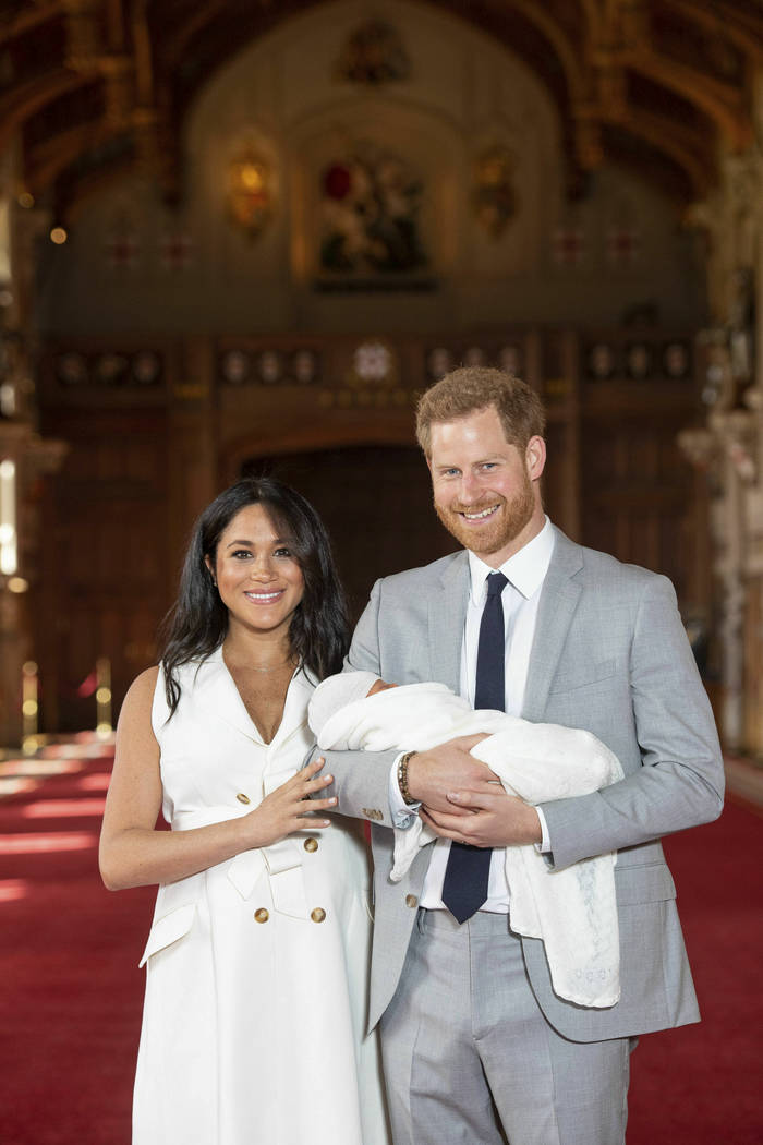 Britain's Prince Harry and Meghan, Duchess of Sussex, during a photocall with their newborn son ...