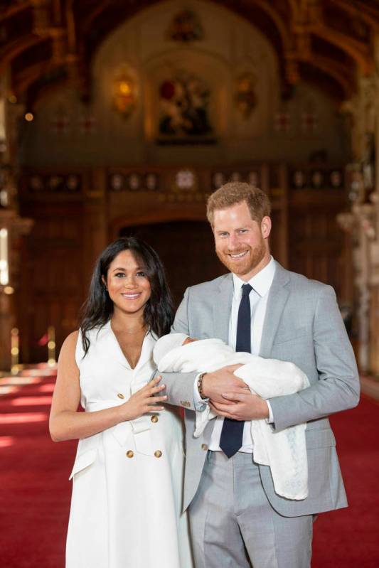 Britain's Prince Harry and Meghan, Duchess of Sussex, during a photocall with their newborn son ...