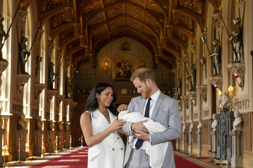 Britain's Prince Harry and Meghan, Duchess of Sussex, during a photocall with their newborn son ...