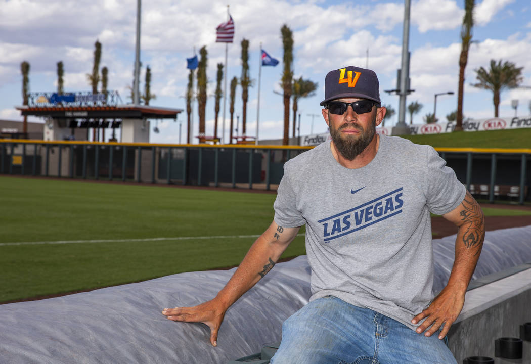 The Aviators head groundskeeper Collin Doebler with their new field tarp at Las Vegas Ballpark, ...