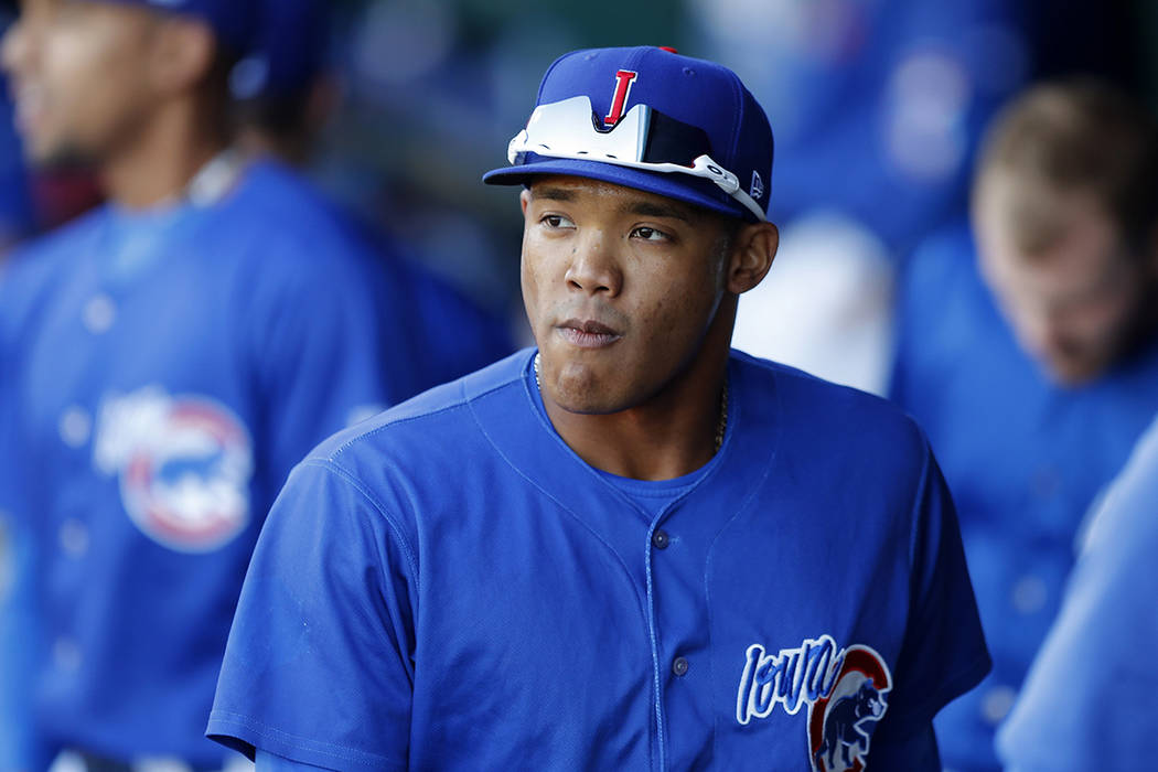 FILE - In this April 24, 2019, file photo, Iowa Cubs shortstop Addison Russell walks in the dug ...