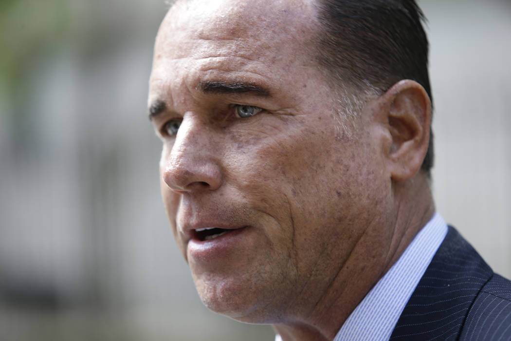 Steve Haney, attorney for Christian Dawkins, speaks to members of the media outside federal cou ...