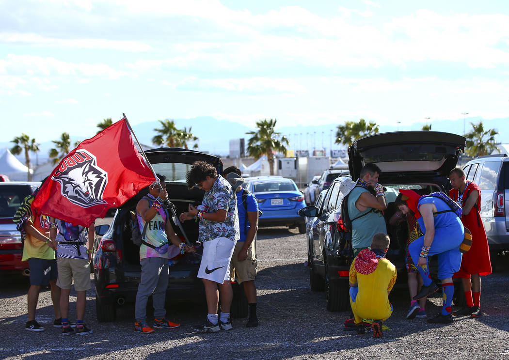 Electric Daisy Carnival attendees finish getting ready before making their way to the Las Vegas ...