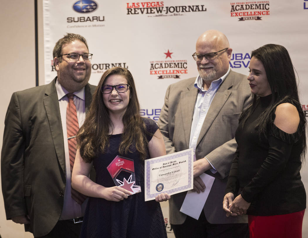 Award winner Cassandra Valenti, second from left, an eighth grader at Bob Miller Middle School, ...