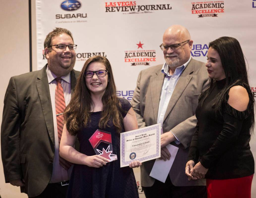 Award winner Cassandra Valenti, second from left, an eighth grader at Bob Miller Middle School, ...