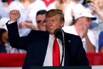 President Trump acknowledges the crowd at the end of his rally in Panama City Beach, Fla., Wedn ...
