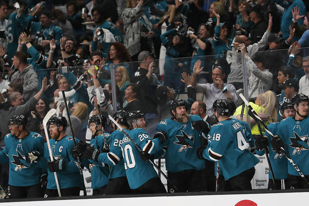 San Jose Sharks players and fans celebrate after Joonas Donskoi scored a goal against the Color ...