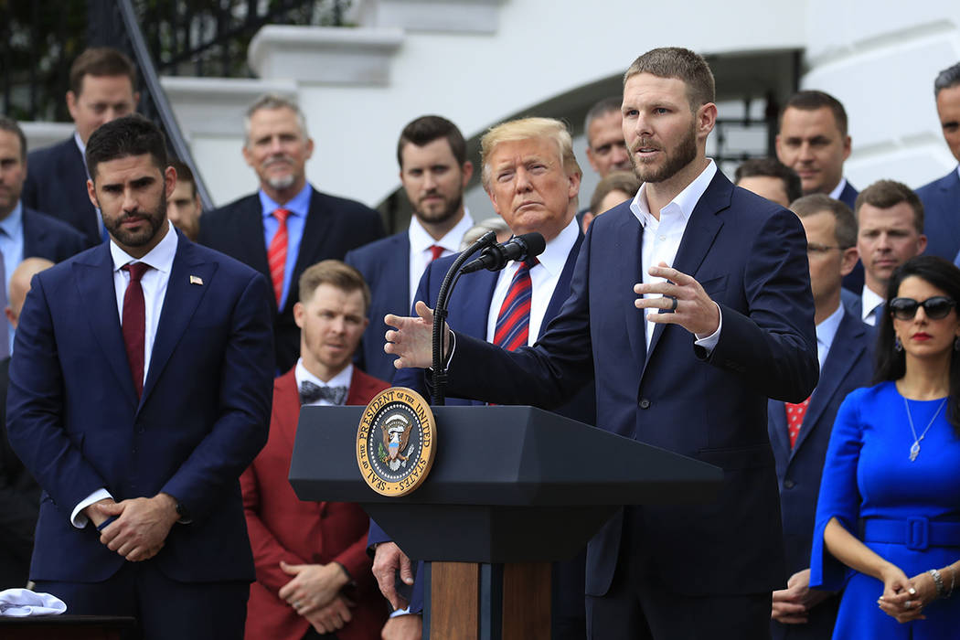 Red Sox pitcher Chris Sale, right, speaks during a ceremony welcoming the 2018 World Series bas ...