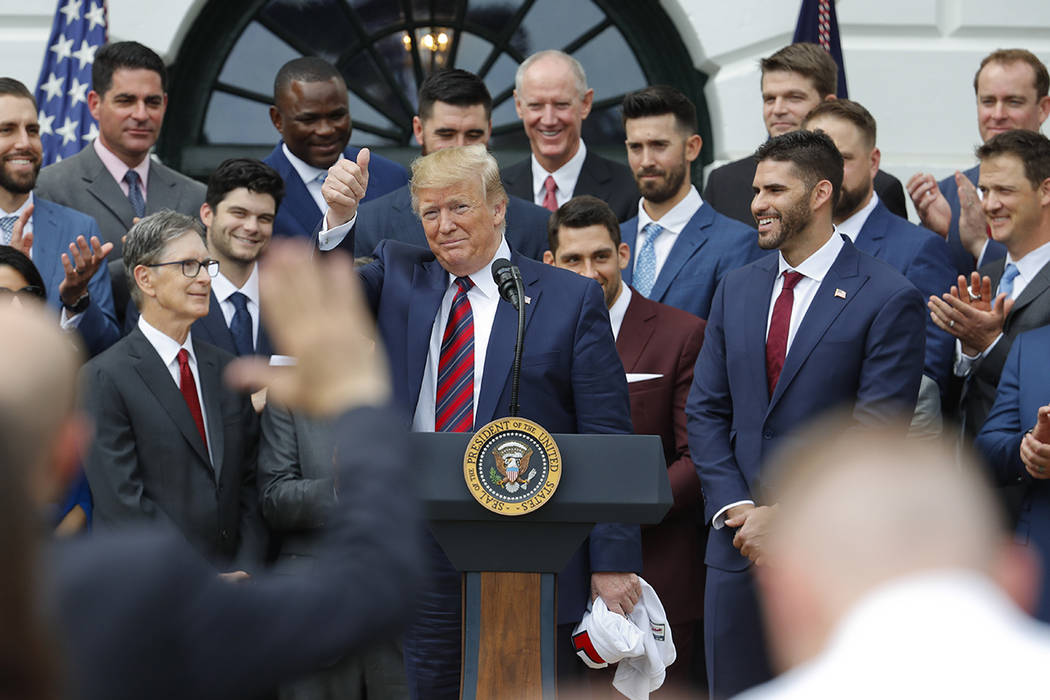 President Donald Trump gestures after speaking during a ceremony on the South Lawn of the White ...