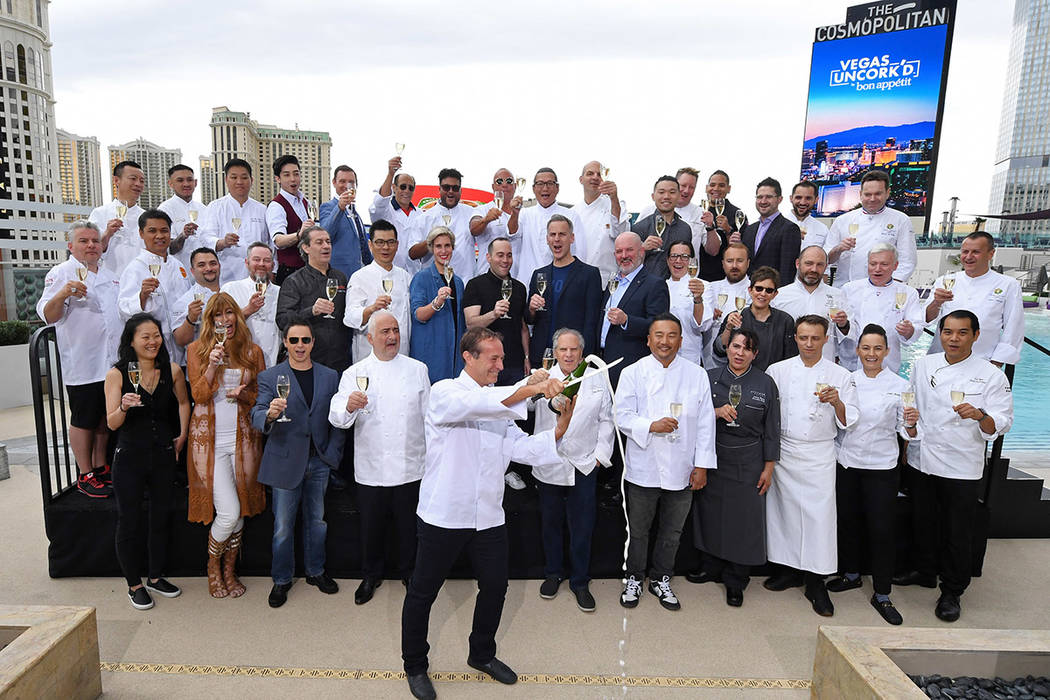 Chef Bruce Bromberg (front) marks the beginning of the 13th annual Vegas Uncork'd by Bon Appeti ...