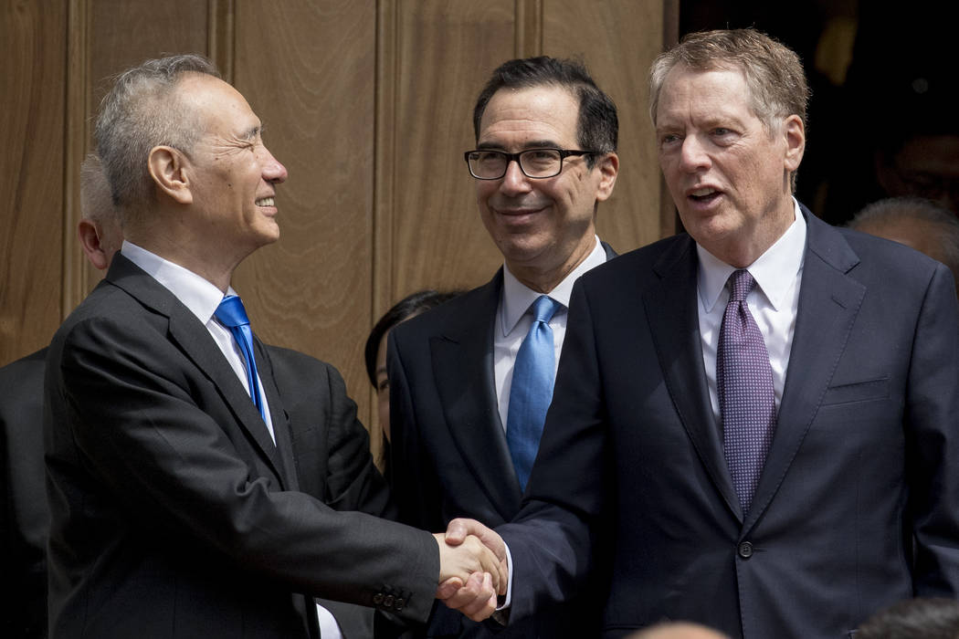 Treasury Secretary Steve Mnuchin, center, and United States Trade Representative Robert Lighthi ...