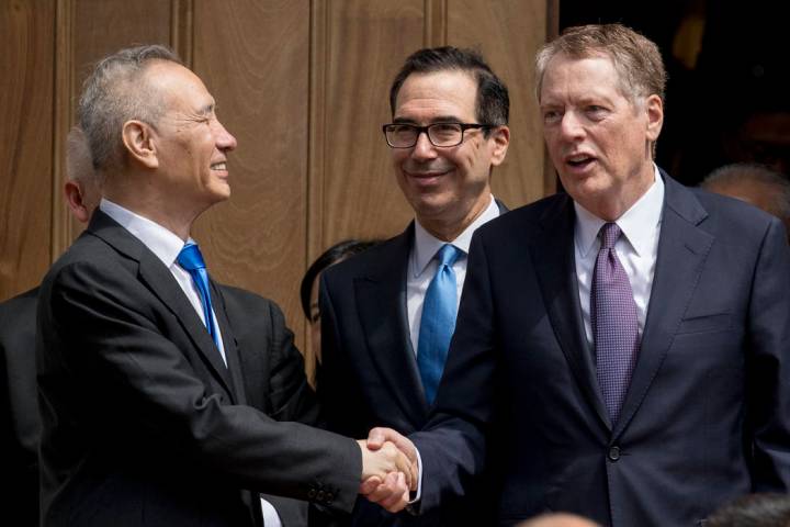 Treasury Secretary Steve Mnuchin, center, and United States Trade Representative Robert Lighthi ...