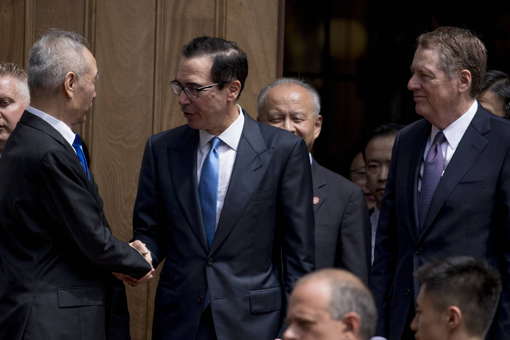 Treasury Secretary Steve Mnuchin, second from left, and United States Trade Representative Robe ...