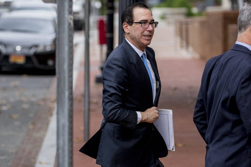 Treasury Secretary Steve Mnuchin arrives at the Office of the United States Trade Representativ ...