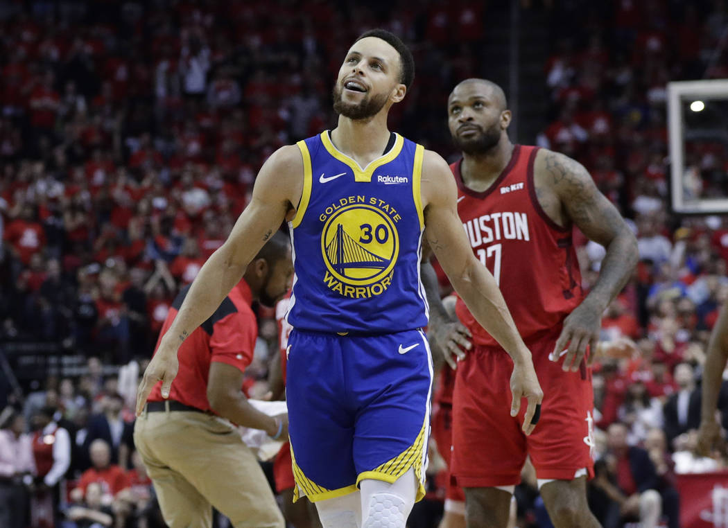 Golden State Warriors guard Stephen Curry (30) walks upcourt after a play during the second hal ...