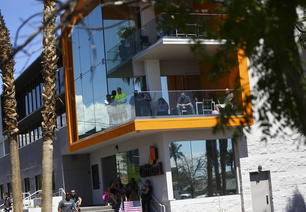 Attendees watch the Helldorado Parade along Fourth Street in downtown Las Vegas on Saturday, Ma ...