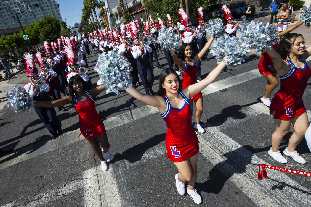 Members of the Valley High School marching band and cheer perform during the Helldorado Parade ...